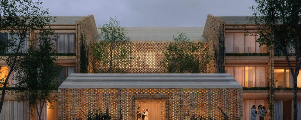 Visualiseringar visar hur Sankt Lukas Hospice byggs som en by i skogsmiljö, med återbrukat tegel och trädgårdsrum mellan byggnaderna. Foto: Bjarke Ingels Group (BIG).