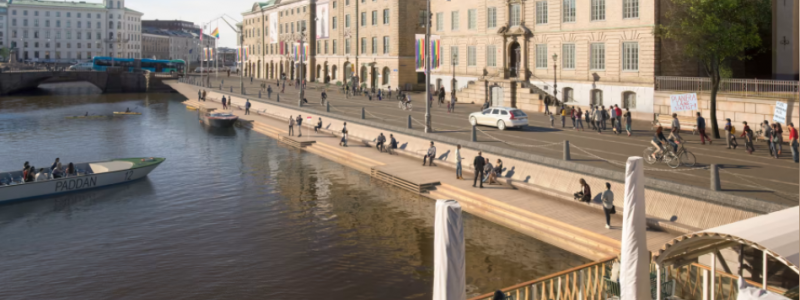 Visionsbild som visar idéer om trädäck längs Stora Hamnkanalen och breda gång- och cykelbanor med enkelriktad biltrafik i mitten på Norra Hamngatan. Visionsbild Göteborgs Stad/White