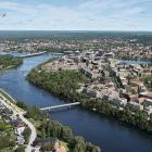 Bilden är en visionsillustration över Norra Ön. Till vänster högst upp skymtar en av de två planerade nya gång- och cykelbroarna. Illustration: SWMS Arkitektur