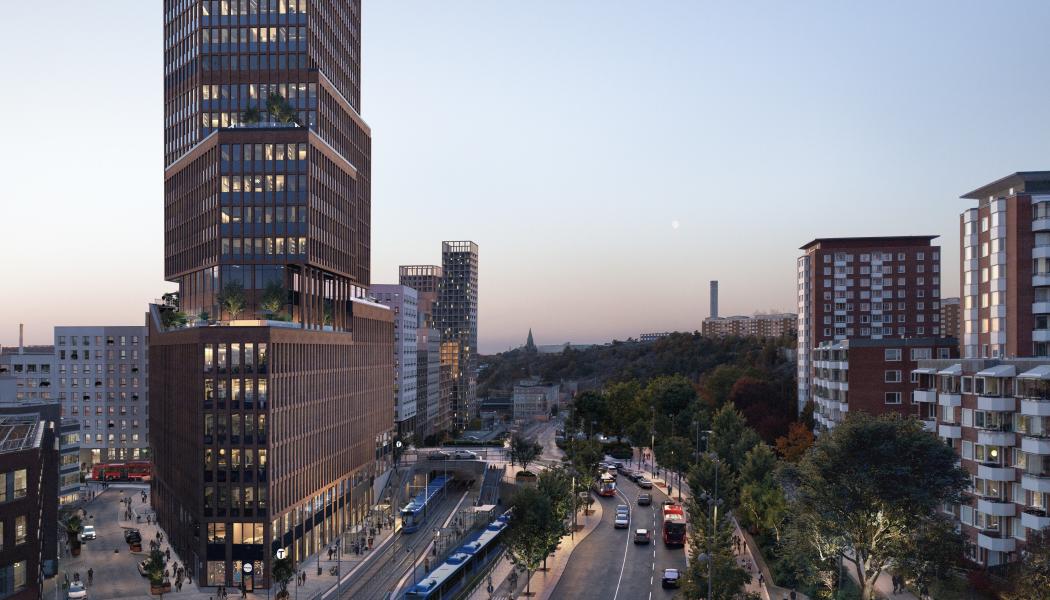 Bilden visar entré till tunnelbanans station Sickla i Sickla stationshus. Entrén vetter mot Saltsjöbanans och Tvärbanans spår. Vy från Värmdövägen i riktning mot Stockholm. Visionsbild: www.tmrw.inc. 