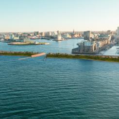 Visionsbild över en av förslagen, en akvedukt som leder ner vägtrafiken under en vattenpassage. Bild: Norconsult
