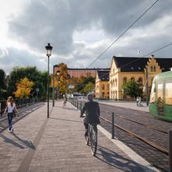 Så här kan det se ut med spårväg över Islandsbron 2029. Visionsbild. Illustration: White arkitekter