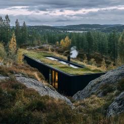 Jordkraft utvecklar små, modulära geotermiska elkraftverk som utformas för att smälta in i naturen. (AI-genererad visionsbild)