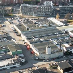 De gamla industrifastigheterna kommer att ersättas av levande bostadskvarter med fokus på hållbarhet. Foto: Riksbyggen