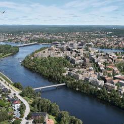 Bilden är en visionsillustration över Norra Ön. Till vänster högst upp skymtar en av de två planerade nya gång- och cykelbroarna. Illustration: SWMS Arkitektur