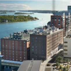 Visionsbild över Havrekvarnen och dess takterrass. Illustration: Walk the room.